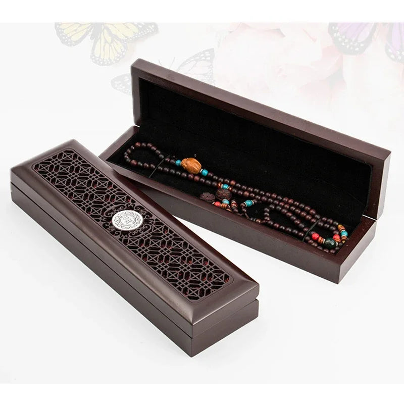 boîtes bois marron foncé boîte bijoux décoration intérieure boutons métalliques ajourés respectueux environnement classique