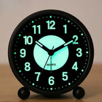 horloge table classique minmaliste noir blanc vert fluorescent numéros quartz pieds sphériques