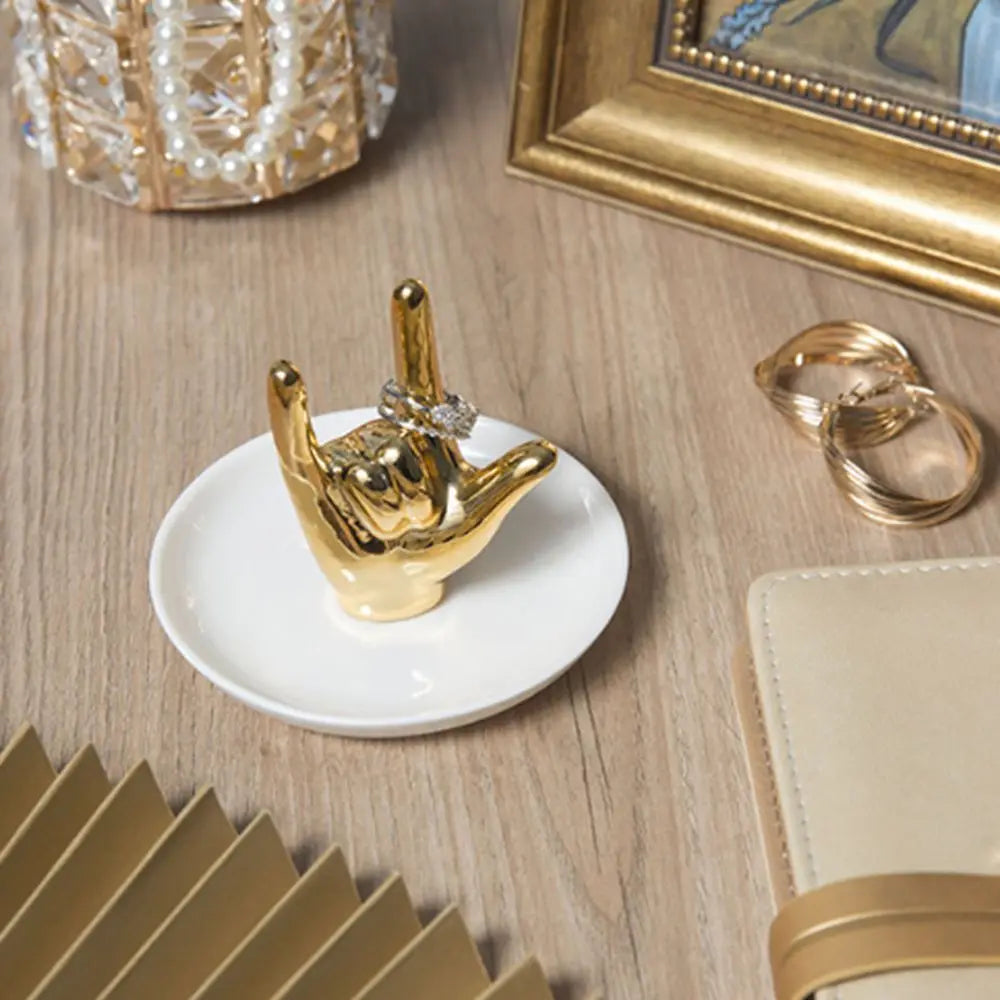 support bijoux main stylisée or argent rose gold blanc moderne