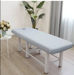 table massage gris blanc vert clair rose pâle uni moderne pieds métalliques couvre lit
