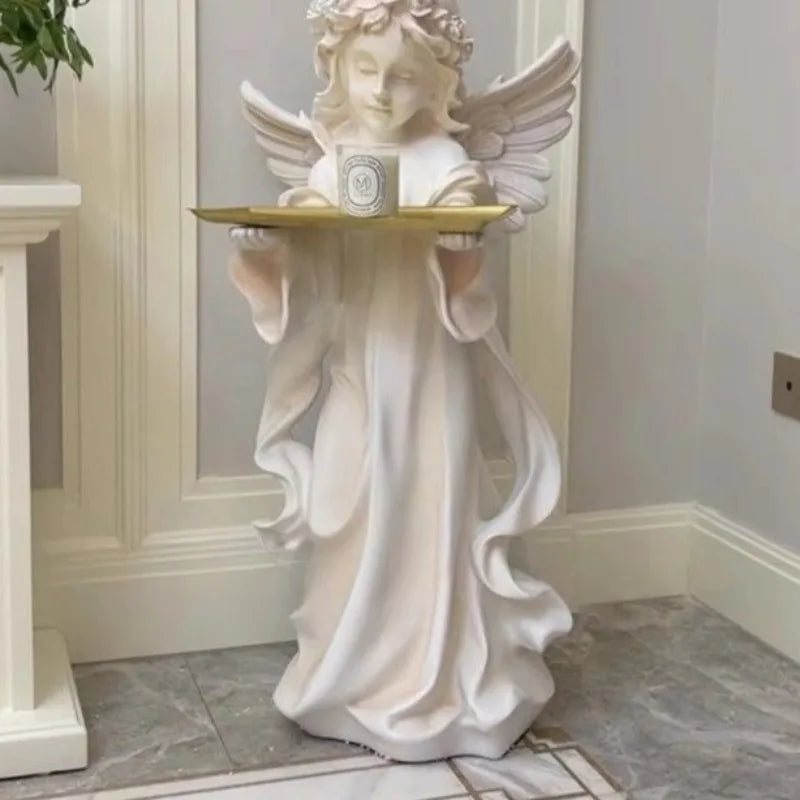 statues anges blanc plateau rangement bougies fleurs séchées décoratives intérieur couronnes roses sculptées