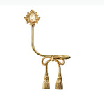 boucles rideau or ailes sculptées classiques décoratives noels dorés deux pièces