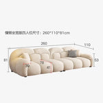 canapé moderne beige corduroy coussins décoratifs bois minimaliste salon maison