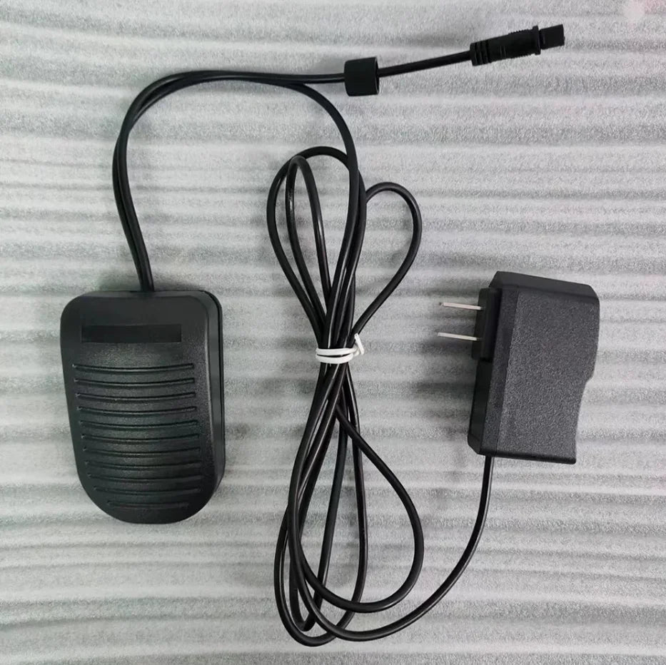lampe uv professionnelle lumière led sans bruit pédale commande noir texture rugueuse pragmatique câble