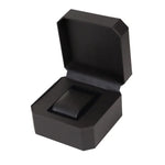 montre vintage cuir noir fond orange boite rangement elegante exposition