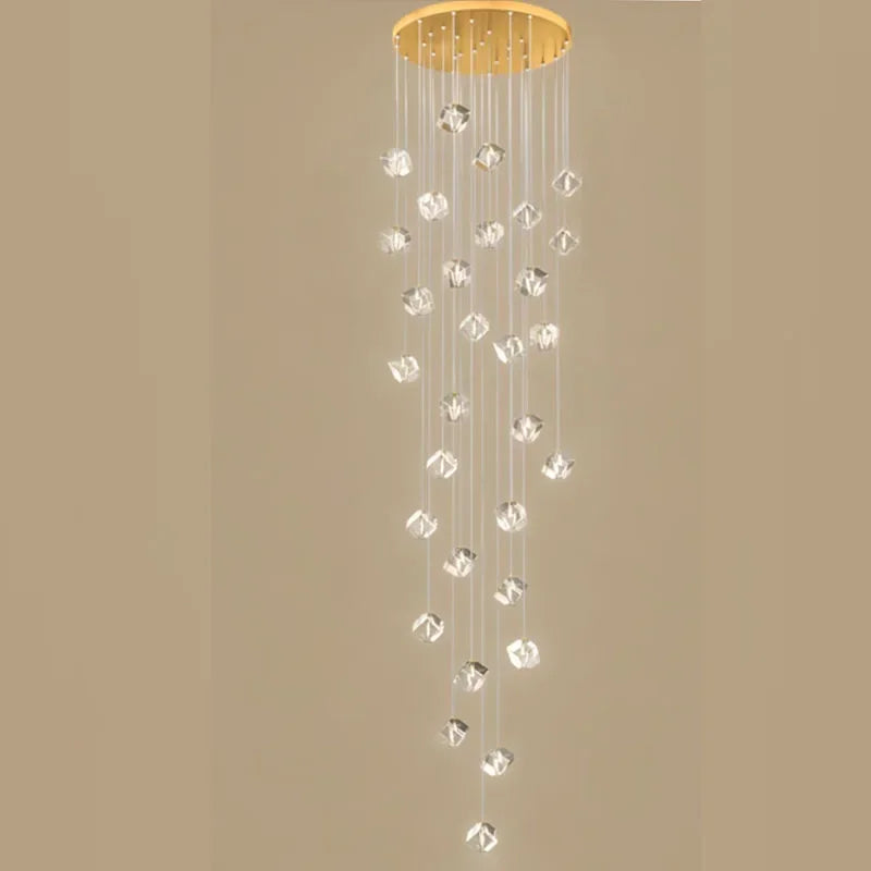 suspension lumineuse moderne transparente dorée facettes géométriques élégantes multiples lampes