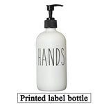 distributeur savon liquide cuisine pompe bois bouteille blanche noire vaisselle mains pot verre
