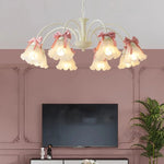chandelier suspension vert pâle rubans roses abat jour translucides chambre enfant romantique