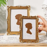 cadres photo vintage or floral strass portraits silhouettes papier texturé semi transparent ornement baroque