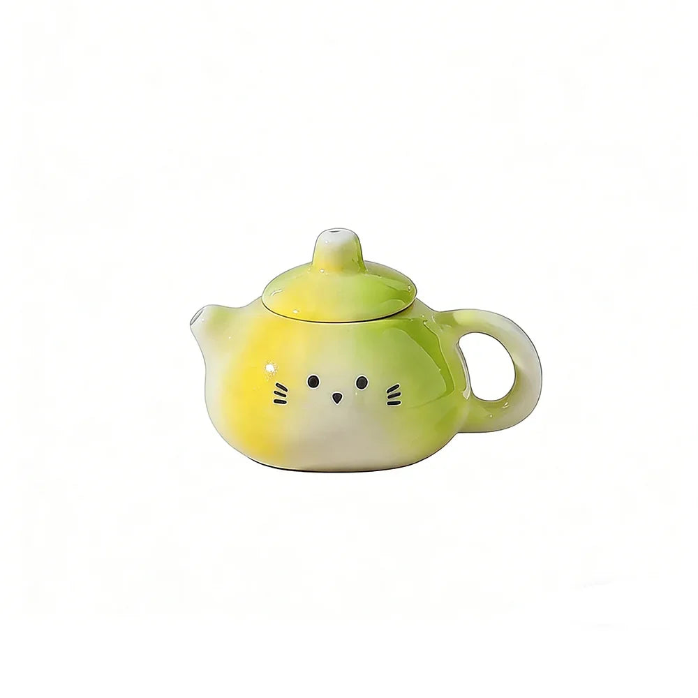 théière forme chat blanc orange rose visage mignon oreilles pointues taches oranges decorative cartoonish