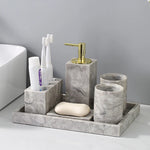 ensemble produits salle bain marbre gris marbré moderne élégant distributeur savon porte gobelets porte