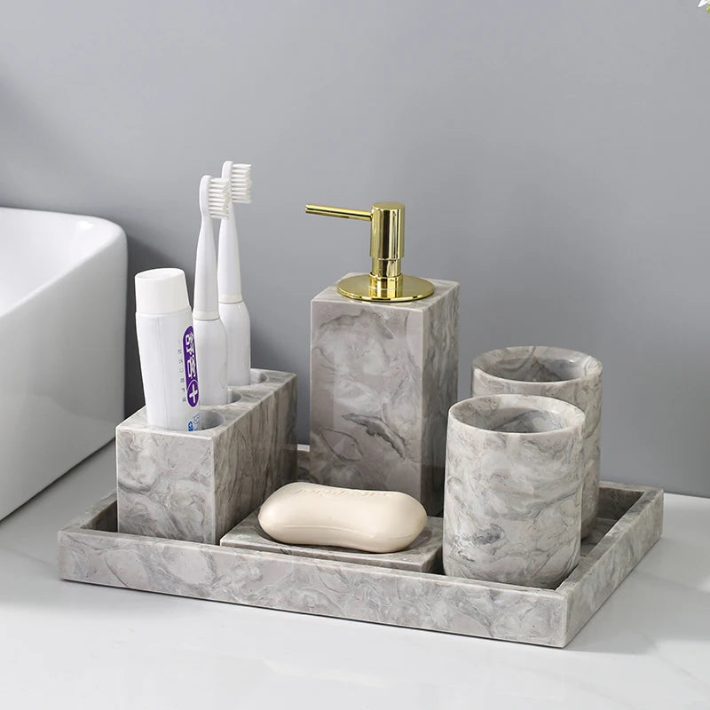 ensemble produits salle bain marbre gris marbré moderne élégant distributeur savon porte gobelets porte