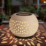 lampe solaire moderne perforations dorées jardin patio extérieur noir éclairage paysager