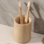 ensemble produits salle bain moderne céramique beige clair porte brosse dents diffuseur parfum distributeur