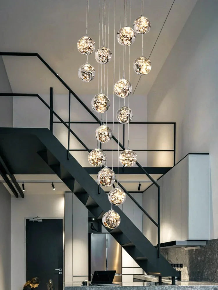 lustre suspension moderne verre transparent brillantes acier argenté luminaire escalier luxe
