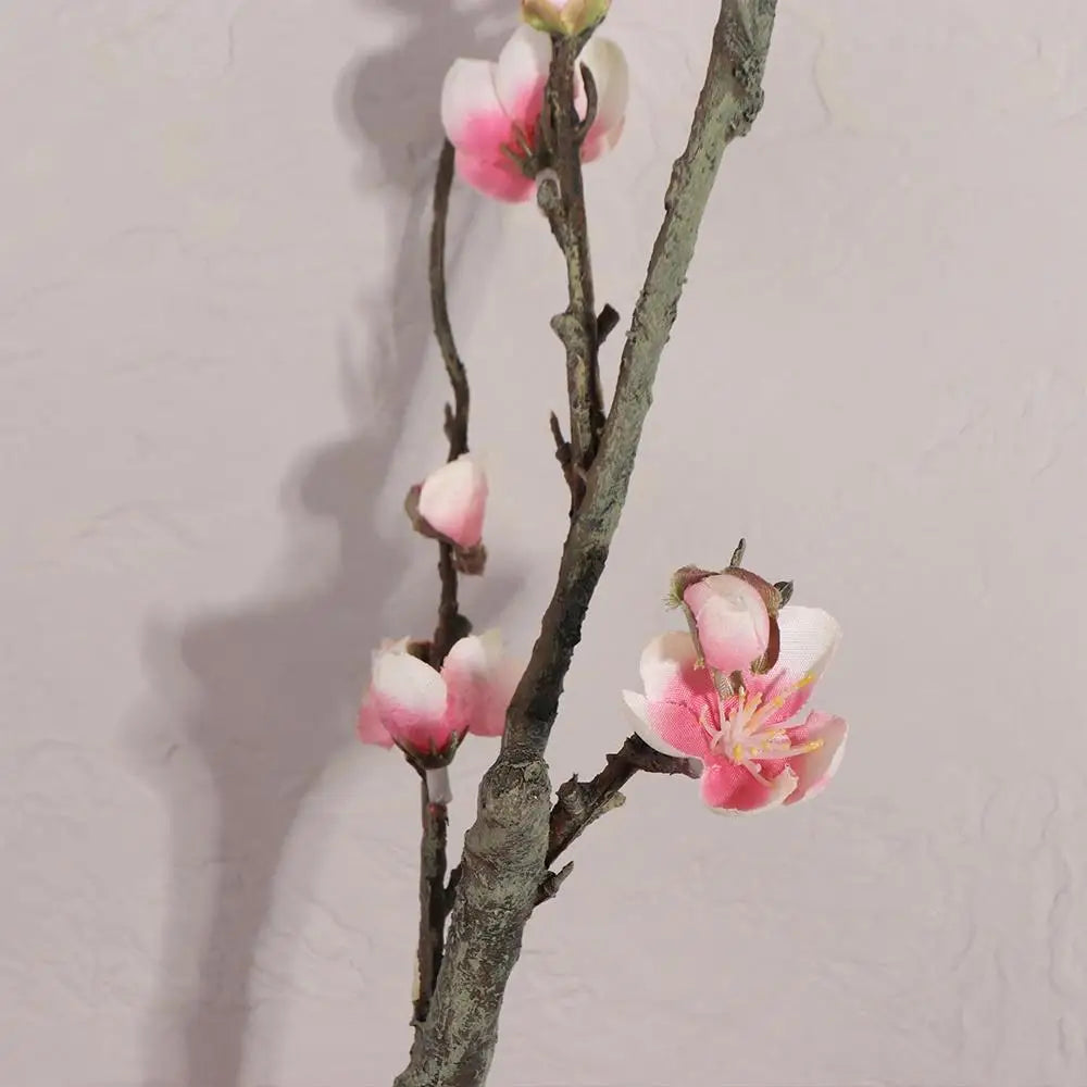 décoration intérieure bouquet fleurs prunier artificielles rose blanches vase transparent minimaliste asian