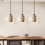 suspension lumineuse moderne pierre texture granulée gris beige noir éclairage ambiance chambre salonhôtel