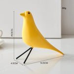 décor oiseau bois peint jaune noir rouge bleu blanc vert pieds métalliques moderne salon