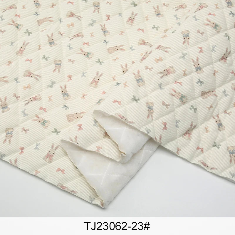 tissu imprimé fleurs lapins blanc rose vert bleu clair vintage enfantin résistant déchirure bricolage
