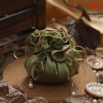 sac cadeau violet satiné ruban doré blanche élégant anniversaire bijoux cadeau opulent 10 pièces