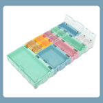 boîtes rangement électroniques vert rose bleu clips fermeture pratiques modernes