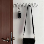 crochet mural orange bleu noir spirale moderne fixations sacs accessoires