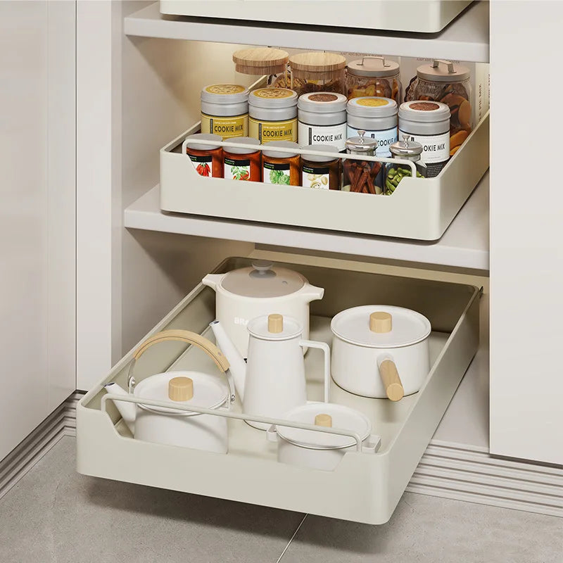 plateaux rangement coulissants cuisine blanc cassé bocaux verre pots bois boîtes alimentaires assiettes tasses