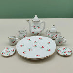 service thé miniature blanc bleu fleurs classique théière crème sucrier tasses assiettes