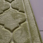 tapis géométrique moderne élégant vert clair bleu marine rouge rose gris clair franges dorées