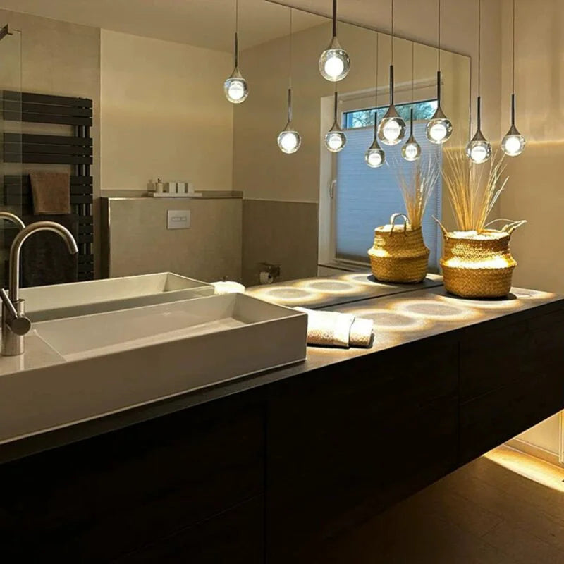 suspension lumineuse moderne noir argenté transparent serviettes peignoirs osier decoration interieur minimaliste