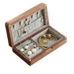 boîte bijoux bois foncé tissu doux élégante colliers boucles doreilles bagues bracelets
