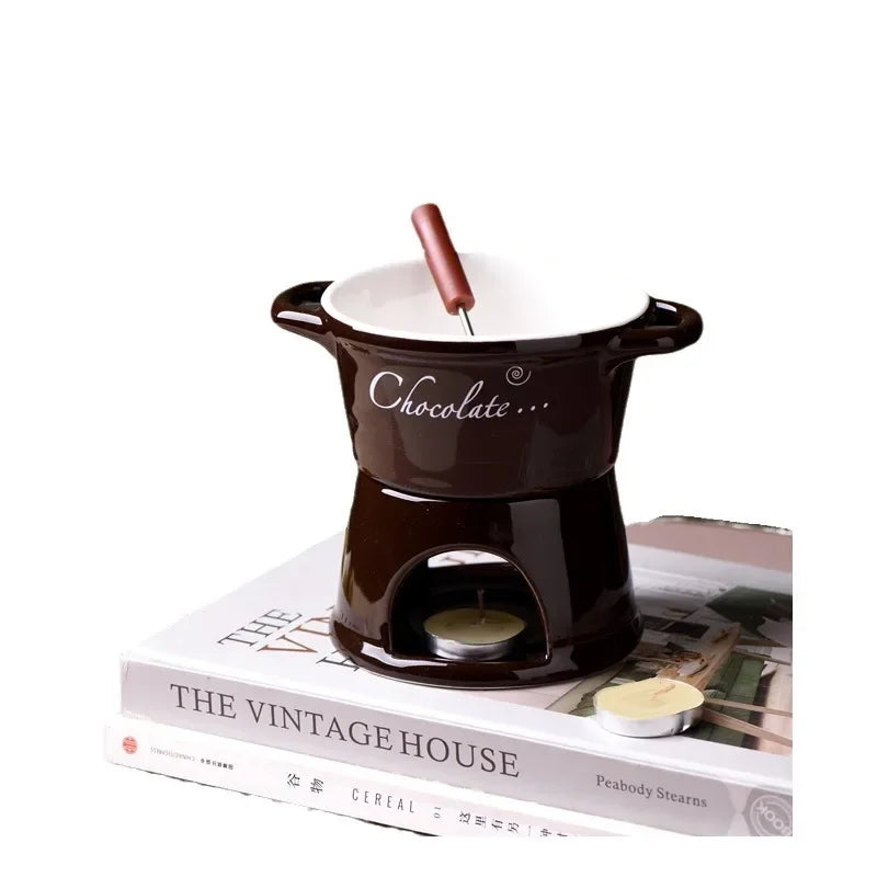 fondue chocolat moderne tasses lait rouge noir blanc cuillère bougie