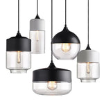 suspension lumineuse moderne pendentif verre noir transparent contemporain fixation câble luminaire salle manger chambre