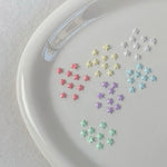 décoration étoiles brillantes résine acrylique mix violet vert bleu blanc 50pcs 5*5mm kawaii