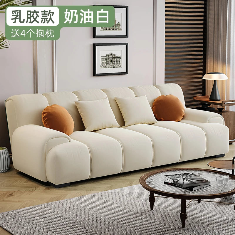 canapé moderne tissu composite couleur beige clair oreillers orange blanc livré kit assemblez vous