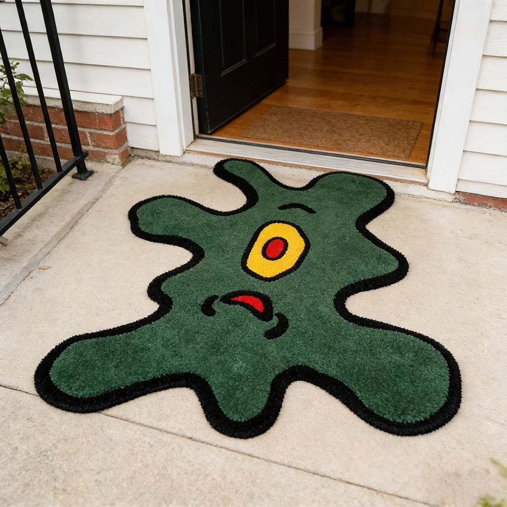 tapis abstrait contemporain vert foncé yeux jaunes sourire rose chambre salon décoration doux lavable