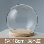 boule verre transparent socle bois décoration d'intérieur moderne objet d'exposition moderne