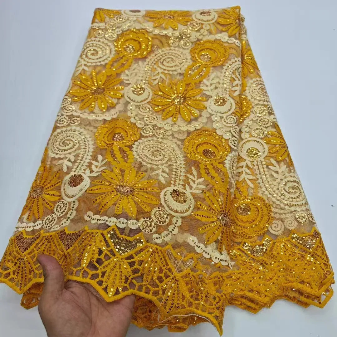 tissu dentelle brodée sequins dorés florals jaune vert rose rouge translucent traditionnel erotique echangiste