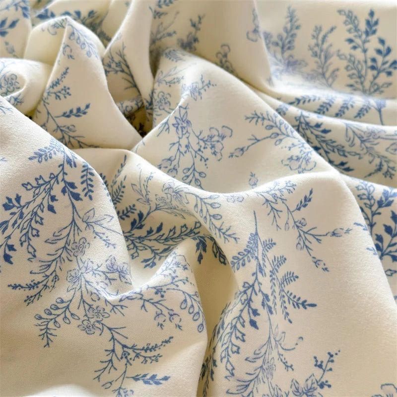 drap housse lit élastique motif fleurs feuilles beige bleu clair classique romantique coton