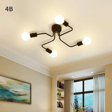 lampe suspension noir blanc moderne scandinave ampoules structure métallique fixations câbles noirs