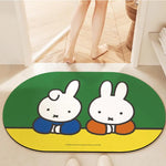 tapis bain dessin animé lapins gris jaune vert bleu rayures enfantin absorbant