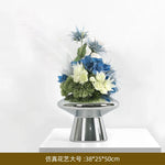 vase moderne argenté brillant fleurs artificielles blanches vertes décoration maison