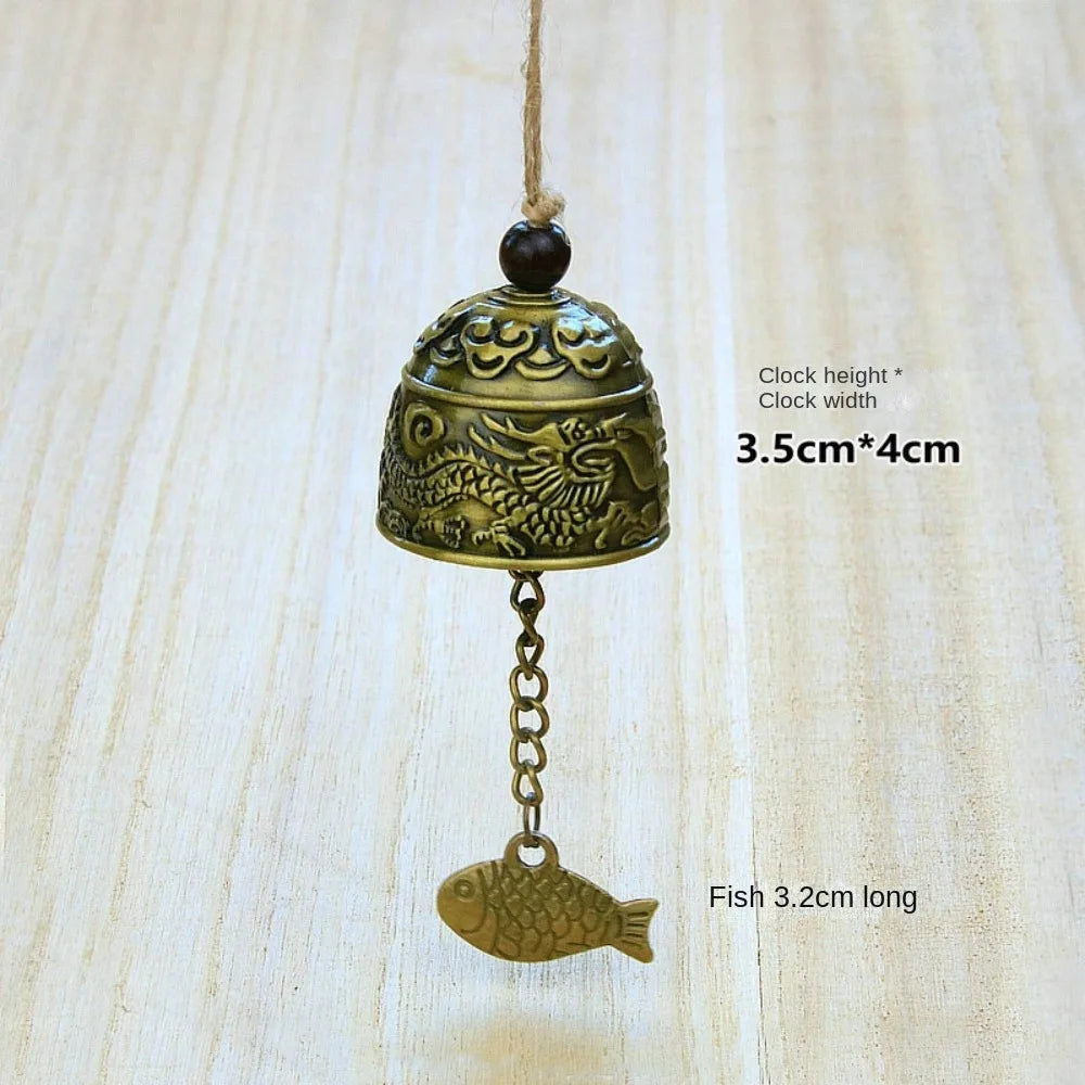 cloche décorative artisanale bronze doré motifs poissons oiseaux vintage(chaines bois)