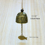 cloche décorative artisanale bronze doré motifs poissons oiseaux vintage(chaines bois)