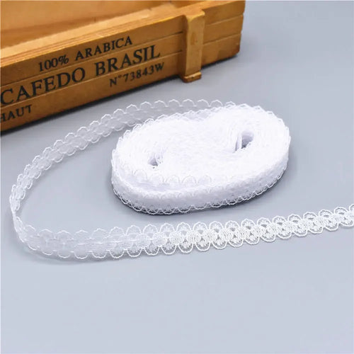 ruban dentelle brodée motif fleurs blanc couture mariage décoration tissu décoratif haut gamme