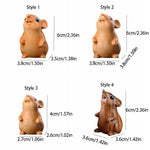 statue animale stylisée souris hamster yeux bleus sculpture bois polie décoration intérieure mignonne brune