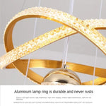 suspension lumineuse moderne or noir diamants transparents anneaux brillants contemporain led