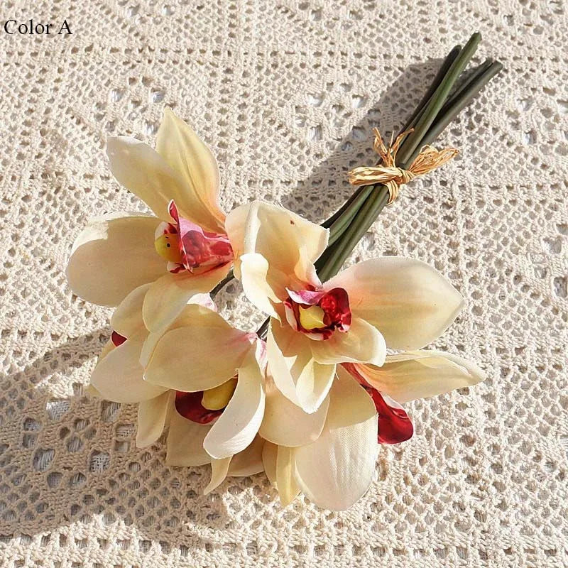 bouquet fleurs artificielles orchidées papillon blanc crème orange violet roseintérieur décoration mariage anniversaire