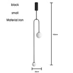 suspension lumineuse moderne sphères translucides structure métallique vis doré noir blanc