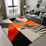 tapis géométrique moderne noir gris orange antidérapant facile nettoyer triangles cercle salon chambre